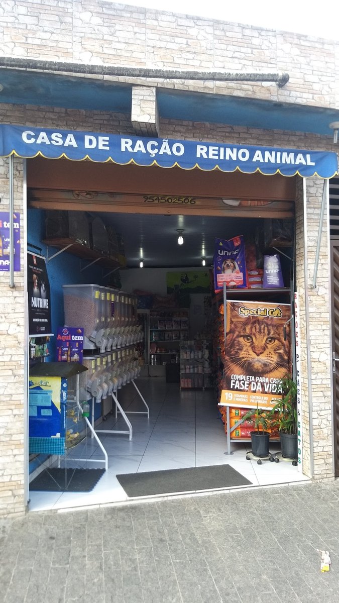 Casa De Ração Reino Animal